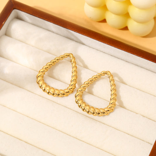Boucles d'oreilles dorées triangle arrondis