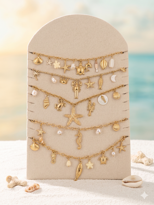 Lot de 5 bijoux à pendentifs marins