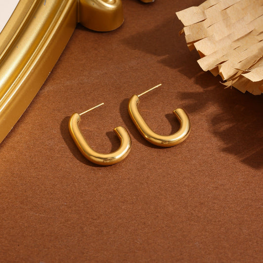 Boucles d'oreilles dorées créoles ouvertes