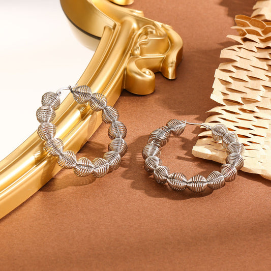 Boucles d'Oreilles Argentées Créoles Rouleaux