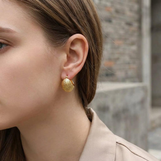 Boucles d’oreilles créoles épaisses bombées texturées