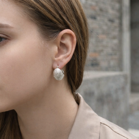 Boucles d’oreilles créoles épaisses bombées texturées