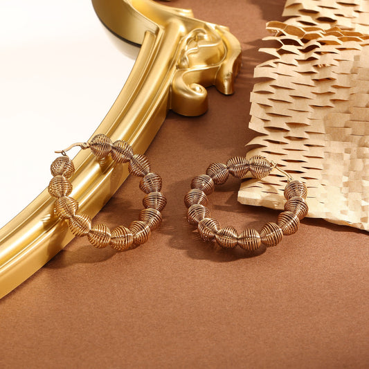 Boucles d'Oreilles Dorées Créoles Epaisses ondulées