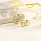 Boucles d'oreilles dorées nœud