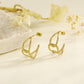 Boucles d'oreilles dorées nœud