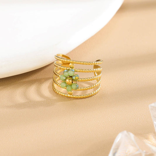 Bague Dorée Multi Anneaux Torsadés Floral Avec Cristaux Vertes
