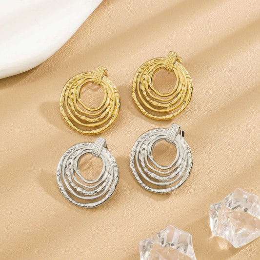 Boucles d'Oreilles Argentées Anneaux Multiples Texturés