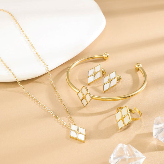 Boucles d'Oreilles Dorées Losange Avec Incrustations Nacre