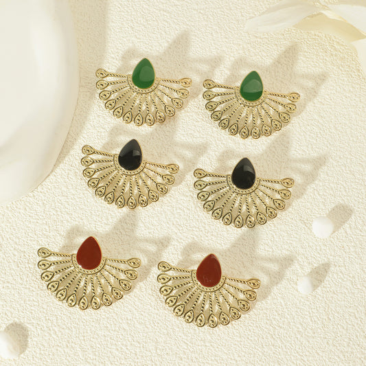 Boucles d'Oreilles Dorées Demi Fleur avec Goutte Rouge