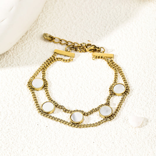 Bracelet double chaîne avec 5 ronds en nacre