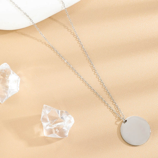 Collier argenté pendentif plaque rond