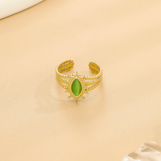 Bague Dorée Ajustable Torsadée Avec Pierre Ovale Verte