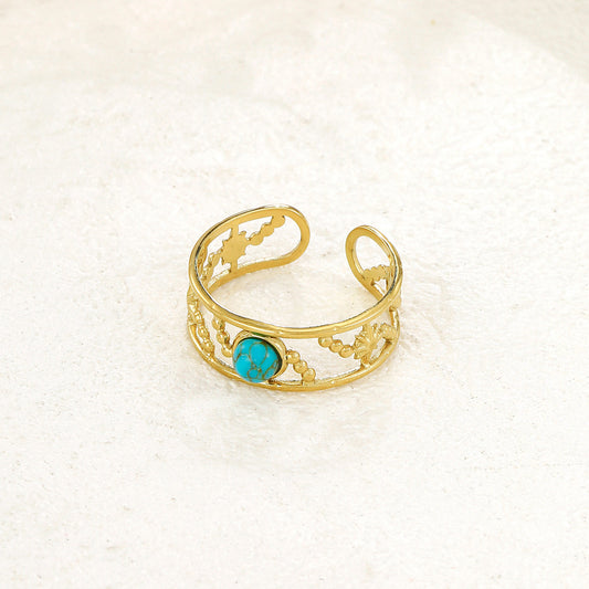 Bague dorée double ligne avec pierre turquoise ronde
