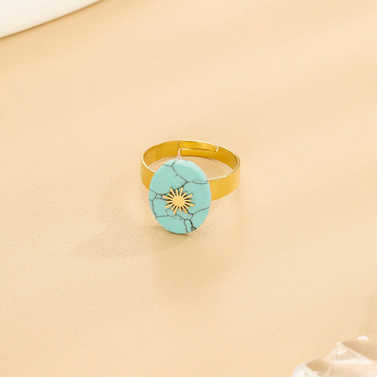 Bague Dorée Ajustable Avec Pierre Ovale Turquoise Et Motif Solaire