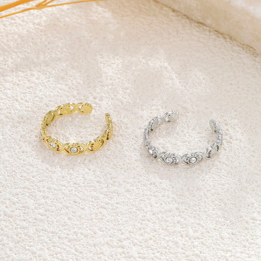 Bague argentée ajustable motif infini ajouré ornée de soleil et de strass