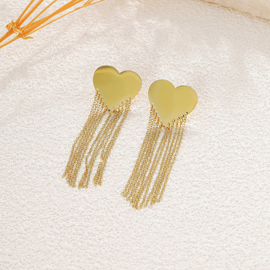 Boucles d'oreilles dorées cœur effet miroir chaînes fines pendantes