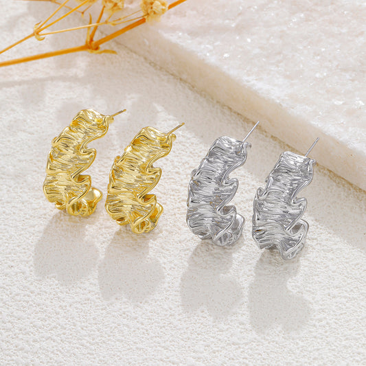 Boucles d'oreilles dorées plissé martelé