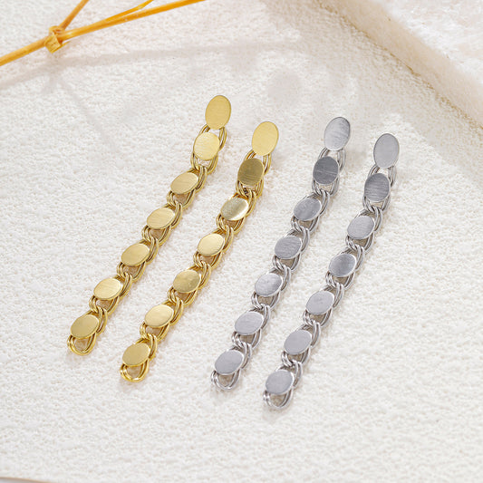 Boucles d’oreilles pendantes dorées maillons ronds lisses