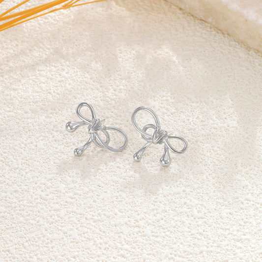 Boucles d'oreilles argentées nœud fin