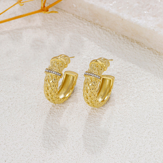 Boucles d'oreilles dorées créoles ouvertes texturées strassées