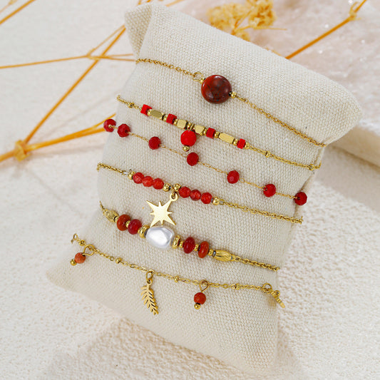 Lot de 6 bracelets colorés pierres rouges sur coussin