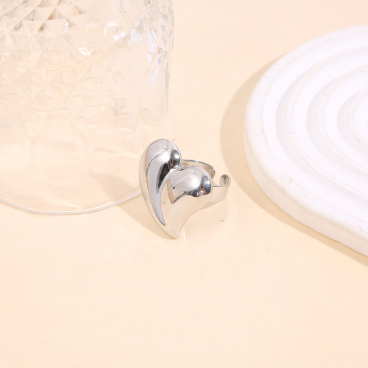 Bague argentée ajustable semi épaisse cœur bombé effet miroir