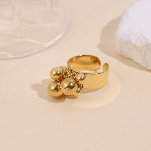 Bague dorée ajustable épaisse ornée de boules rondes