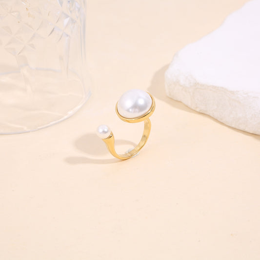 Bague ouverture avant perle texturé avec encadrement lisse