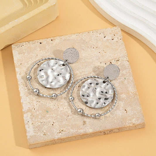 Boucles d'Oreilles Argentées Martelées Pendantes