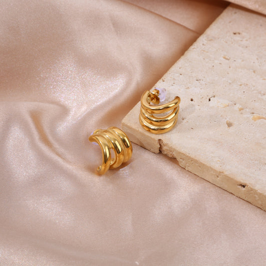 Boucles d'oreilles dorées triple anneaux