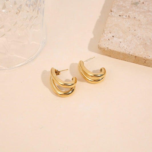 Boucles d’oreilles dorées demi-créoles doubles bombées effet miroir