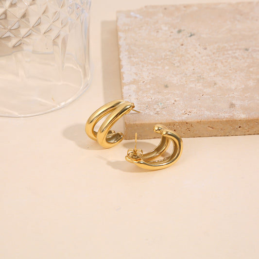 Boucles d’oreilles dorées demi-créoles doubles bombées effet miroir