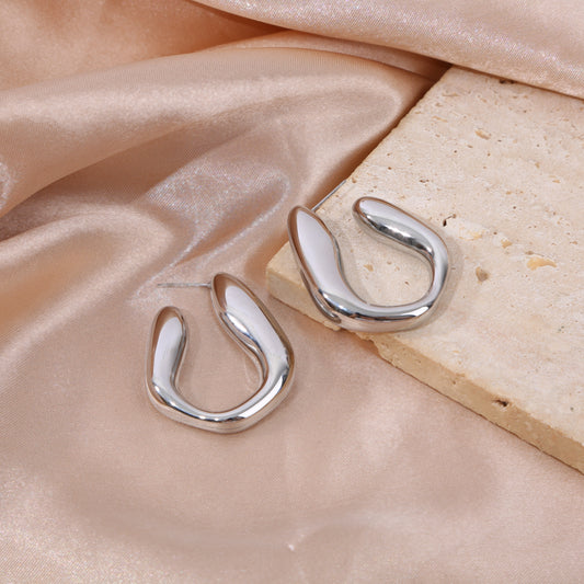 Boucles d'oreilles argentées ouvertes forme goutte irrégulière effet miroir