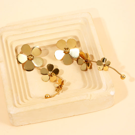 Boucles d'Oreilles Pendantes Dorées Fleur Articulée Brillante