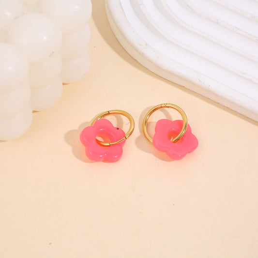 Boucles d'oreilles créoles dorée fleur résine rose