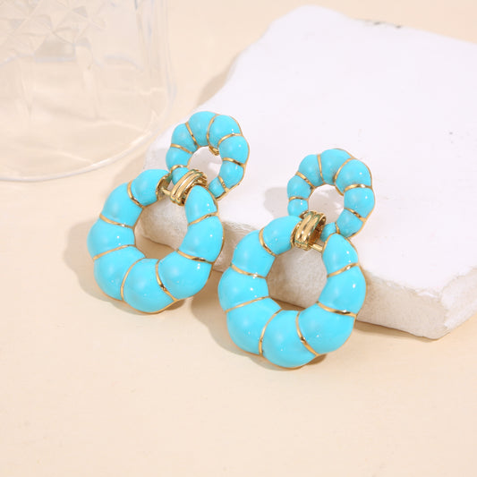 Boucles d'oreilles pendantes double anneaux émaillées bleues