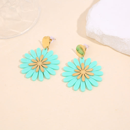 Boucles d'oreilles pendantes dorées résine turquoise fleur