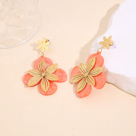 Boucles d'oreilles pendantes double fleur résine orange