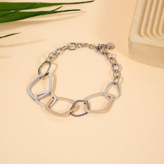 Bracelet Chaîne Argentée À Anneaux Irréguliers