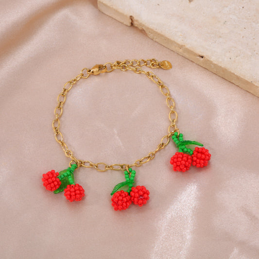 Collier doré 5 cerises tissés