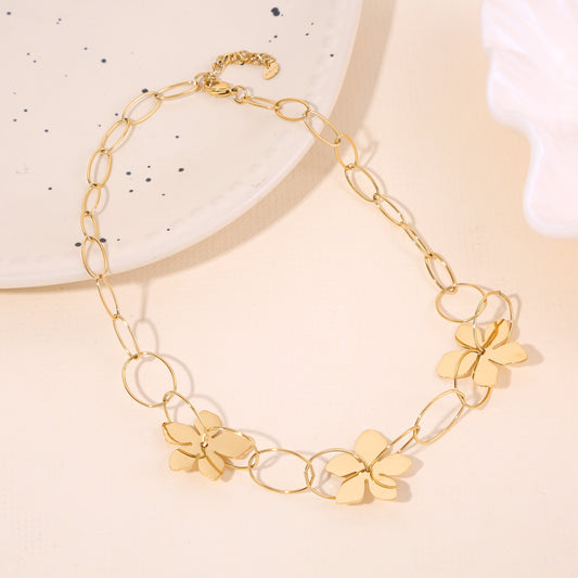 Collier Chaîne Maillons Ovales Dorées Avec Fleurs Ajourées Brillantes