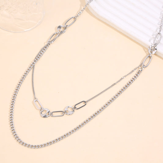 Collier sautoir argenté multi-rangs à maillons variés chaînes fines, maille gourmette grands maillons ovales
