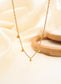 Collier doré avec petits pendentifs ronds