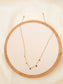 Collier doré avec petits pendentifs ronds