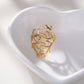 Bague dorée ajustable par l'avant arbre