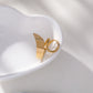 Bague dorée ajustable par l'avant calin