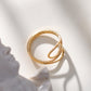 Bague dorée ajustable par l'avant calin lignes