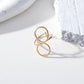 Bague dorée ajustable en forme de 8