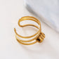 Bague dorée triple lignes avec roues