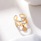 Bague dorée ajustable double ligne avec pendentif